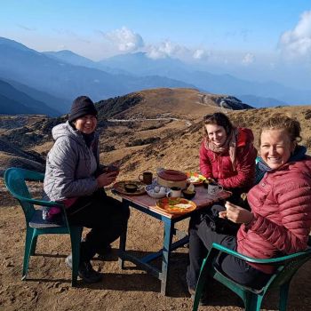 Ashmita Trek and Tours guest pic at Phalut with background ridge pic